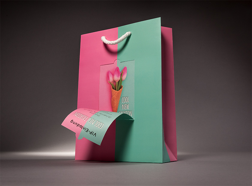 Printed paper bag with detachable coupon