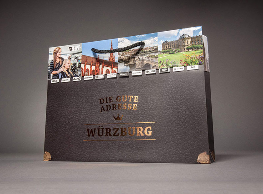 Printed paper carrier bag with detachable coupon, Würzburg logo