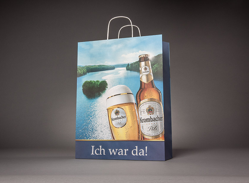 Printed paper bag with paper cord, Krombacher motif