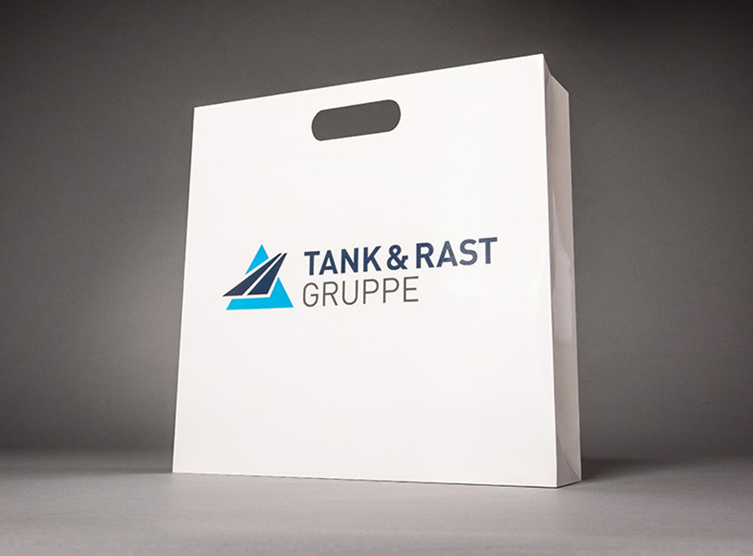 Printed paper bag with handle, Tank & Rast Gruppe motif
