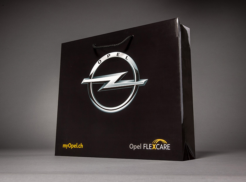 Printed paper bag with cord, VW Opel logo