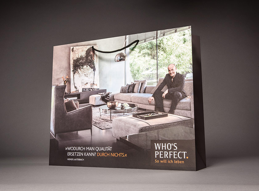 Printed paper bag with cord, “Who's perfect” motif